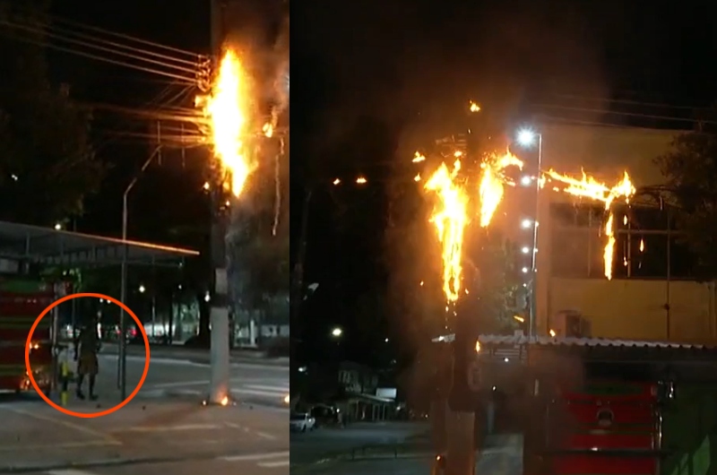 Homem passeia debaixo de poste pegando fogo na Avenida Boulevard; veja vídeo