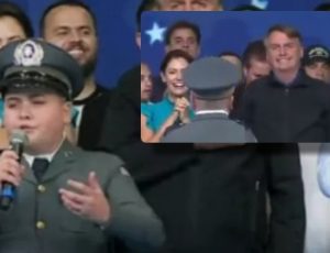 Criança vestida de militar canta hino nacional e emociona presidente: “Bandeira jamais será vermelha”; veja vídeo