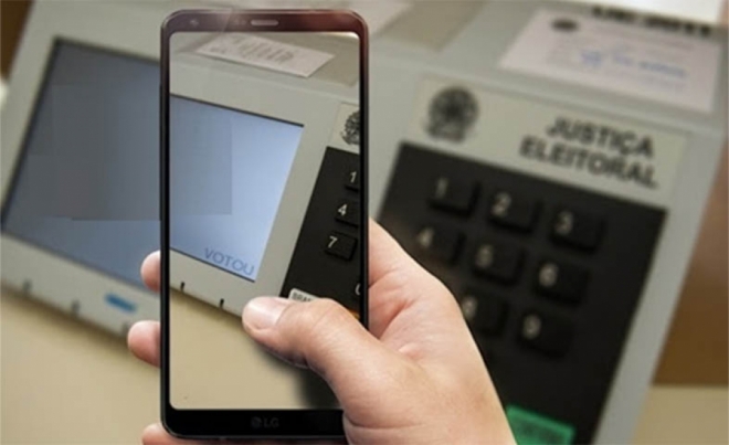 Eleitor que não entregar o celular na hora de votar poderá ser preso, decide TSE