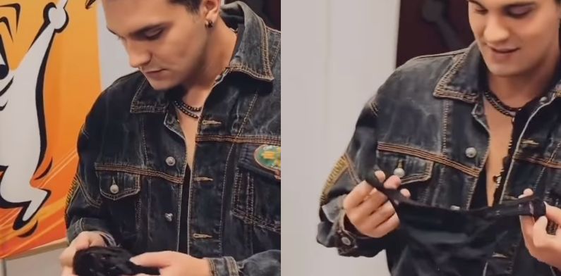 Luan Santana é presenteado com calcinha de fã e reação surpreende; veja vídeo