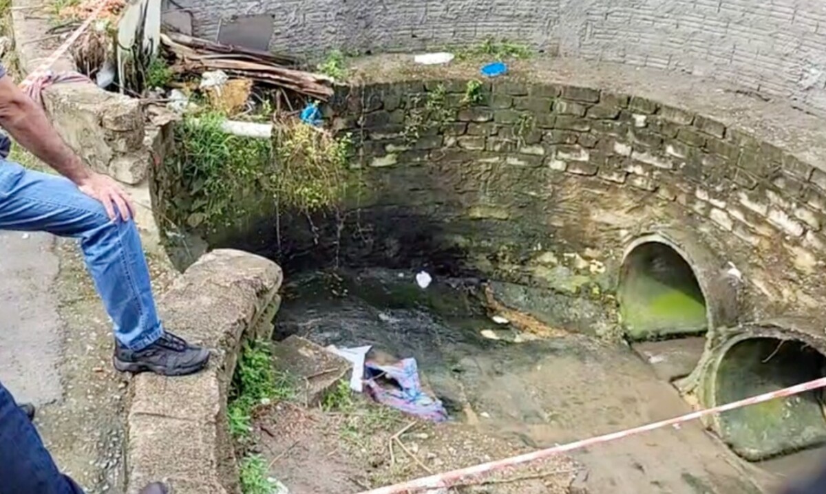 Urgente: facção desova corpo em bueiro do Jorge Teixeira; veja imagens