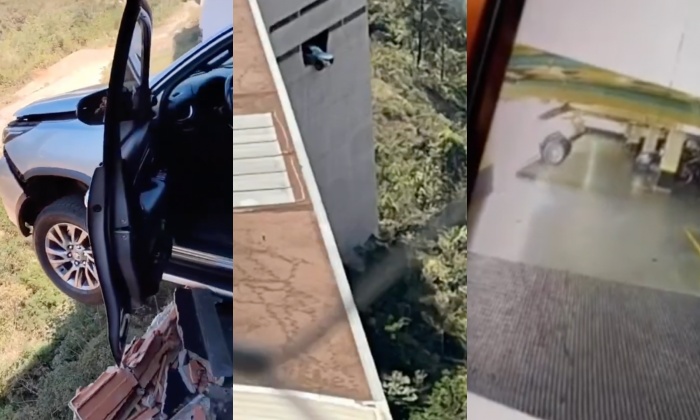 Desesperador: motorista derruba muro de estacionamento e carro fica pendurado a metros de altura; veja vídeo