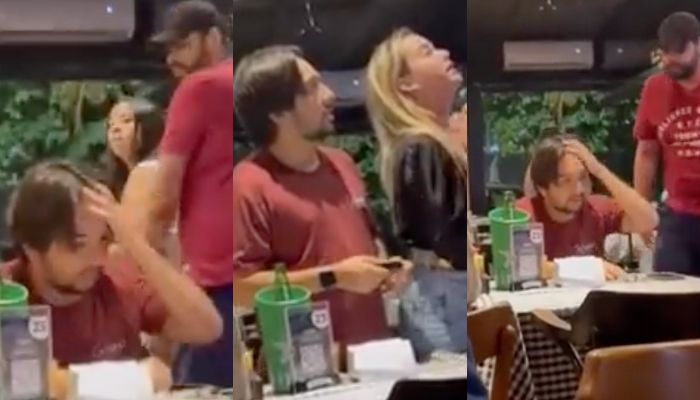 “Seu br0cha!”: esposa encontra marido jantando com duas amantes e mete o s0c0 nele; veja vídeo