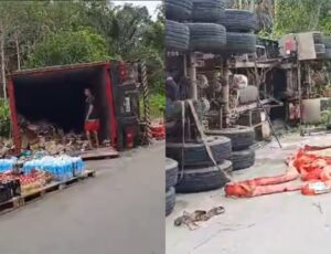 Urgente: carreta tomba na AM-010 e deixa alimentos na pista; veja vídeo