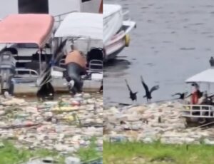 Lixo e urubus se acumulam com a subida do Rio Negro; veja vídeo