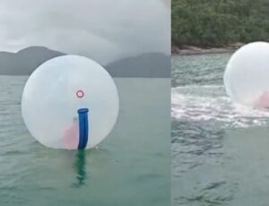 Criança fica à deriva no mar dentro de bolha Inflável após cabo de segurança se soltar; veja vídeo