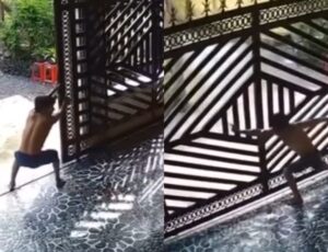 Brincadeira besta termina com portão caindo em cima de pai e filho; veja vídeo