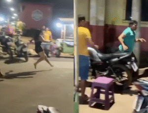 População "dá lição" em homem que tentou dar golpe de terçado em mulher no meio da rua; veja vídeo