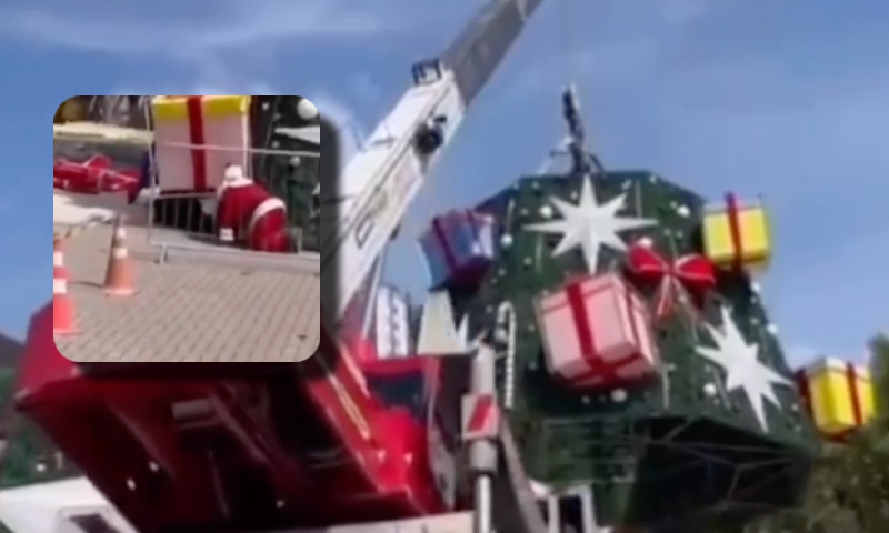 “O Papai Noel quase morre”: veja momento em que guindaste tomba durante construção de árvore de natal no Largo