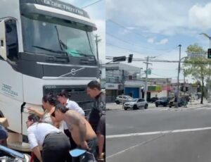 Urgente: piloto de Harley-Davidson vai parar debaixo de caminhão na avenida Rodrigo Otávio, em Manaus; veja vídeo