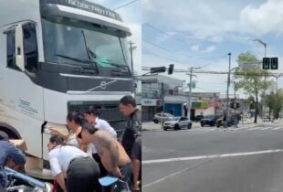 Urgente: piloto de Harley-Davidson vai parar debaixo de caminhão na avenida Rodrigo Otávio, em Manaus; veja vídeo