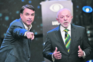 Flávio Bolsonaro marca 47%, Lula tem 46% e empate vai a 50% nos votos válidos